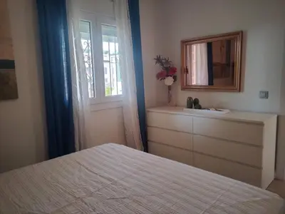 Cama o camas de una habitación en Ático con vistas al Puerto de Aguadulce
