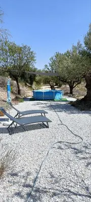 Piscina en o cerca de Cortijo Ciprés