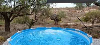 Piscina en o cerca de Cortijo Ciprés