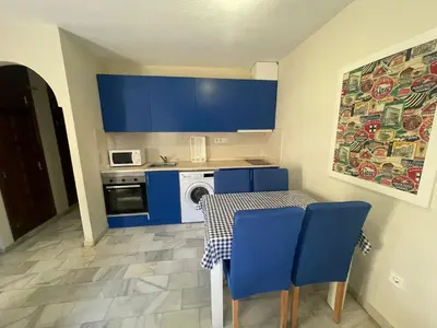 Una cocina o zona de cocina en Apartamento en Vera Playa