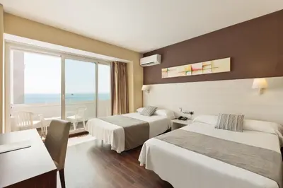 Cama o camas de una habitación en Hotel Best Indalo