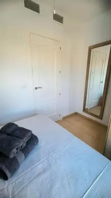 Cama o camas de una habitación en Apartamento dos habitaciones con piscina y gran terraza