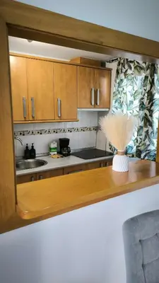 Una cocina o zona de cocina en Apartamento dos habitaciones con piscina y gran terraza