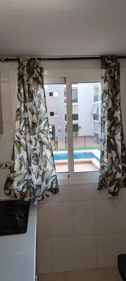 Cama o camas de una habitación en Apartamento dos habitaciones con piscina y gran terraza