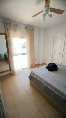 Cama o camas de una habitación en Apartamento dos habitaciones con piscina y gran terraza