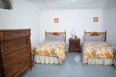 Cama o camas de una habitación en Cueva Navarro