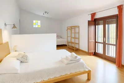 Cama o camas de una habitación en Cortijo Relatillos