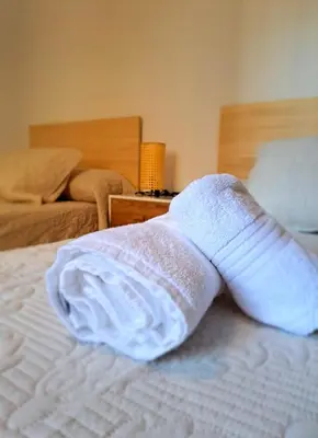 Cama o camas de una habitación en 5 Apartamentos Cómodos en el Corazón de Baza