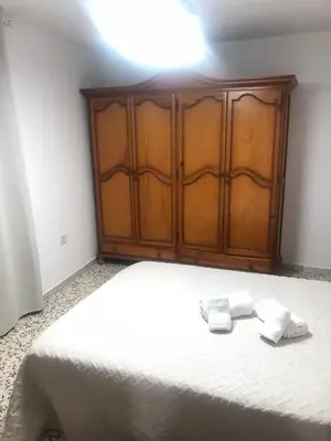Cama o camas de una habitación en 5 Apartamentos Cómodos en el Corazón de Baza