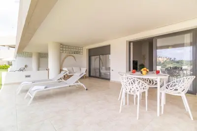 Un balcón o terraza de Vera Golf Los Dos Soles Bajo Jardín Piscina Wifi