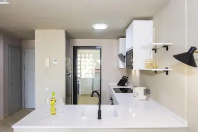 Una cocina o zona de cocina en Vera Golf Los Dos Soles Bajo Jardín Piscina Wifi