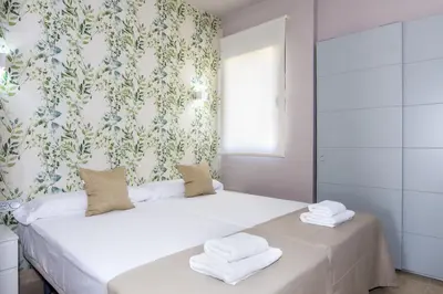 Cama o camas de una habitación en Vera Golf Los Dos Soles Bajo Jardín Piscina Wifi