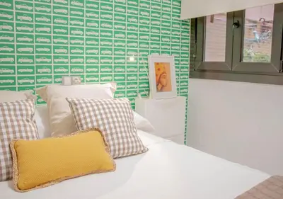 Cama o camas de una habitación en Apartamento Boutique TOKIO