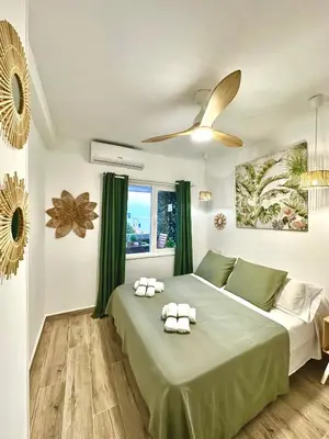 Cama o camas de una habitación en Apartamento Villa Azul, 1ª línea de playa