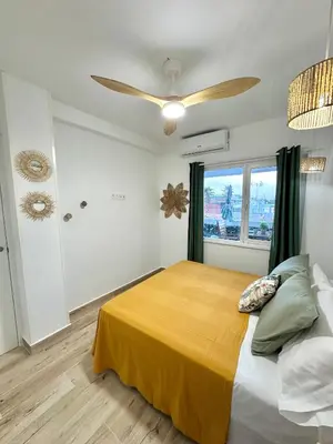 Cama o camas de una habitación en Apartamento Villa Azul, 1ª línea de playa