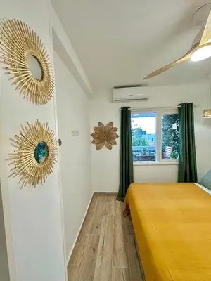 Cama o camas de una habitación en Apartamento Villa Azul, 1ª línea de playa