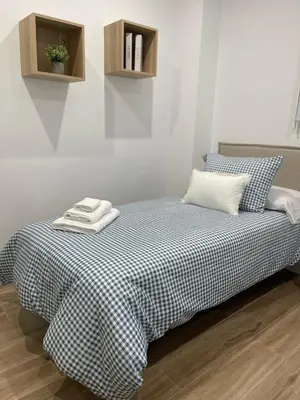 Cama o camas de una habitación en El Alto de los Bohemios