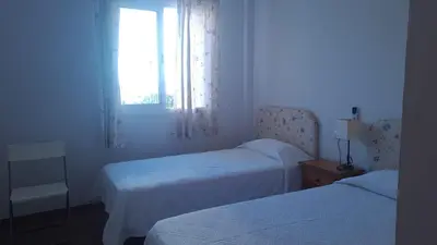 Cama o camas de una habitación en Mojacar apartamento amplio y tranquilo