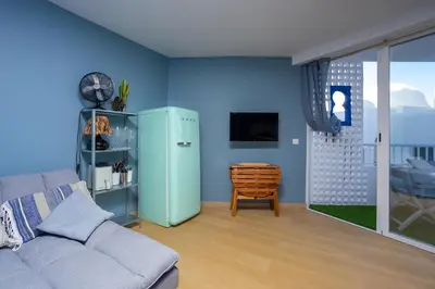 Una televisión o centro de entretenimiento en TrendyHomes Neptuno Mojacar