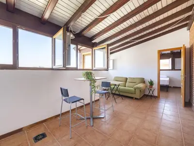 Zona de estar de Apartment Ático Playa Zapillo by Interhome