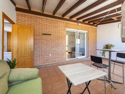 Zona de estar de Apartment Ático Playa Zapillo by Interhome
