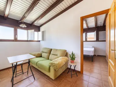 Zona de estar de Apartment Ático Playa Zapillo by Interhome