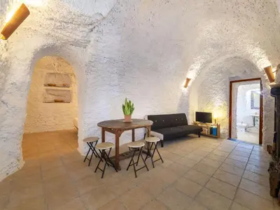 Zona de estar de Holiday Home Cueva Maria Zambrano by Interhome