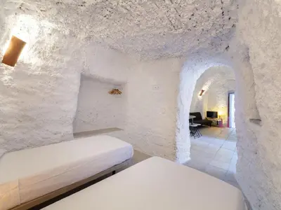 Cama o camas de una habitación en Holiday Home Cueva Maria Zambrano by Interhome