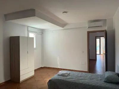 Cama o camas de una habitación en Espacioso Dúplex con terraza y vistas