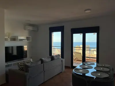 Zona de estar de Espacioso Dúplex con terraza y vistas