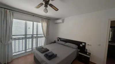 Cama o camas de una habitación en Naturista Vera Playa