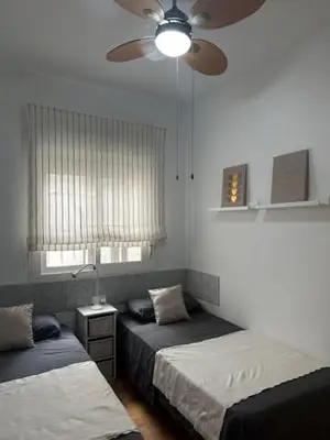 Cama o camas de una habitación en Piso Caramel