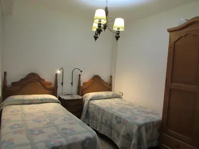 Cama o camas de una habitación en AGUADULCE BEACH FRoNT