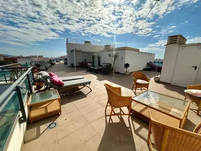 Un balcón o terraza de Terraza 250 m2 # BBQ # Playa 8min # Padel # WIFI # Apartamento