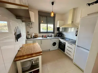 Una cocina o zona de cocina en Terraza 250 m2 # BBQ # Playa 8min # Padel # WIFI # Apartamento