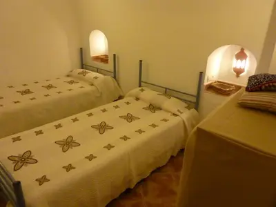 Cama o camas de una habitación en Casa-Cueva Las Colleras