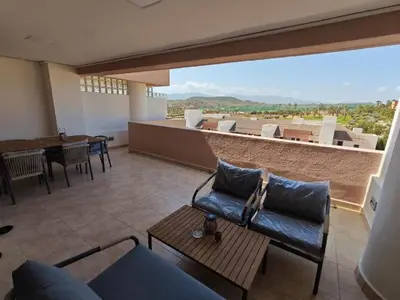 Zona de estar de luxury homes valle del este resort golf luxe one