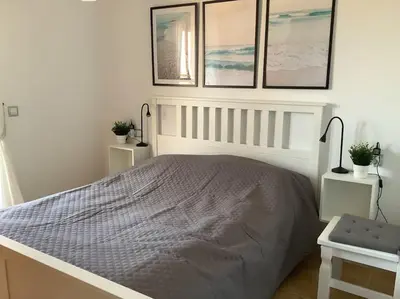 Cama o camas de una habitación en Seaview-lägenhet med stor takterass