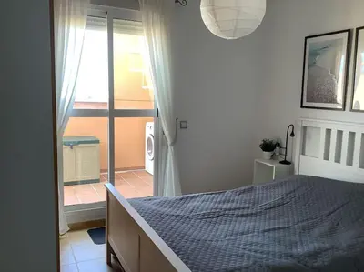 Cama o camas de una habitación en Seaview-lägenhet med stor takterass