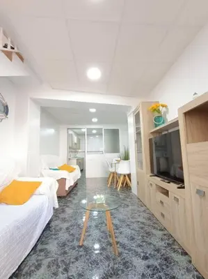 Cama o camas de una habitación en casita en playa de la colonia