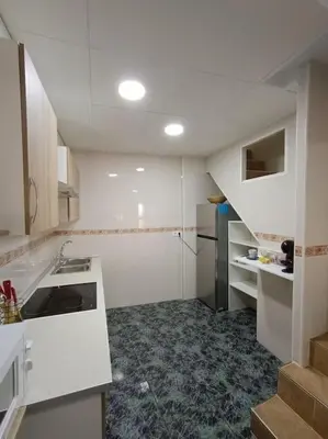 Una cocina o zona de cocina en casita en playa de la colonia