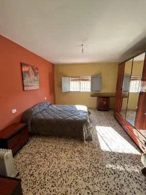 Cama o camas de una habitación en Casa Rural Los Laureles