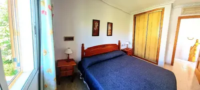 Cama o camas de una habitación en Chalet 3 dormitorios en VERAMAR 5 con jardín
