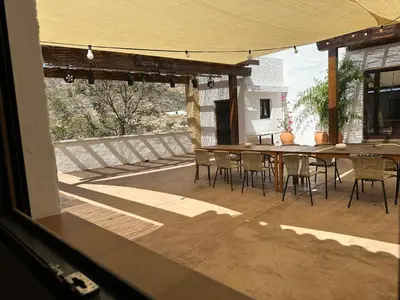 Un balcón o terraza de Romántico estudio rodeado de naturaleza con jacuzzi gigante