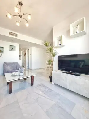 Una televisión o centro de entretenimiento en Apto DulcesSueños, Retamar, Cabo de Gata