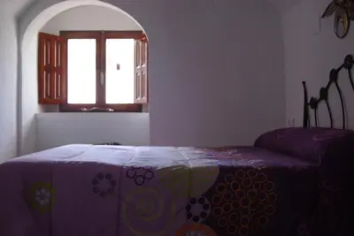 Cama o camas de una habitación en Cueva de María 1
