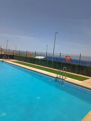 Piscina en o cerca de Duplex en Garrucha con parking