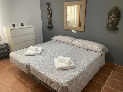Cama o camas de una habitación en Casa Manila Primera línea de playa Mojácar