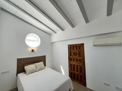 Cama o camas de una habitación en Casa de la Abuela, a estrenar! escapada Rural