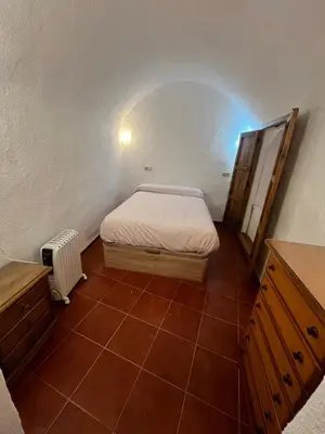 Cama o camas de una habitación en Casa Cueva la estación